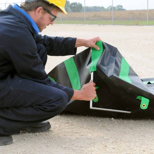 An affordable spill containment berm that uses "L" brackets for sidewall support and it best for longer-term storage needs.
