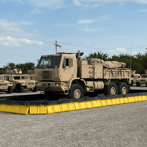 Containment wall with military vehicles