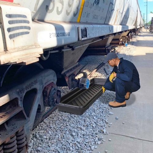 Utility Tray_Man Placing under Train_3